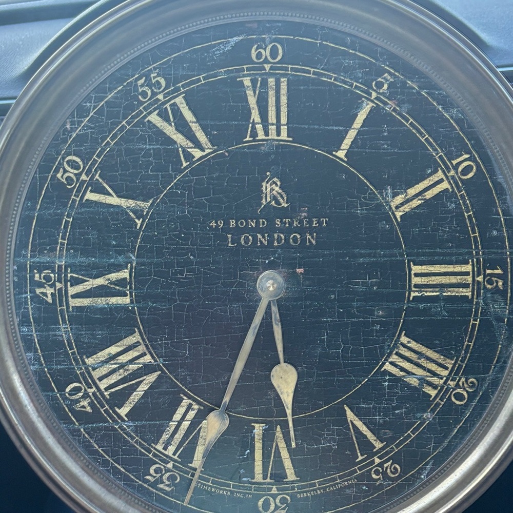 Regency Bond Street 
Authentic Time-works 
Elegant Black and Gold Wall Clock
